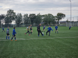 Laatste training S.K.N.W.K. JO10-1 (partijtje tegen de ouders) van woensdag 22 mei 2024 (13/133)